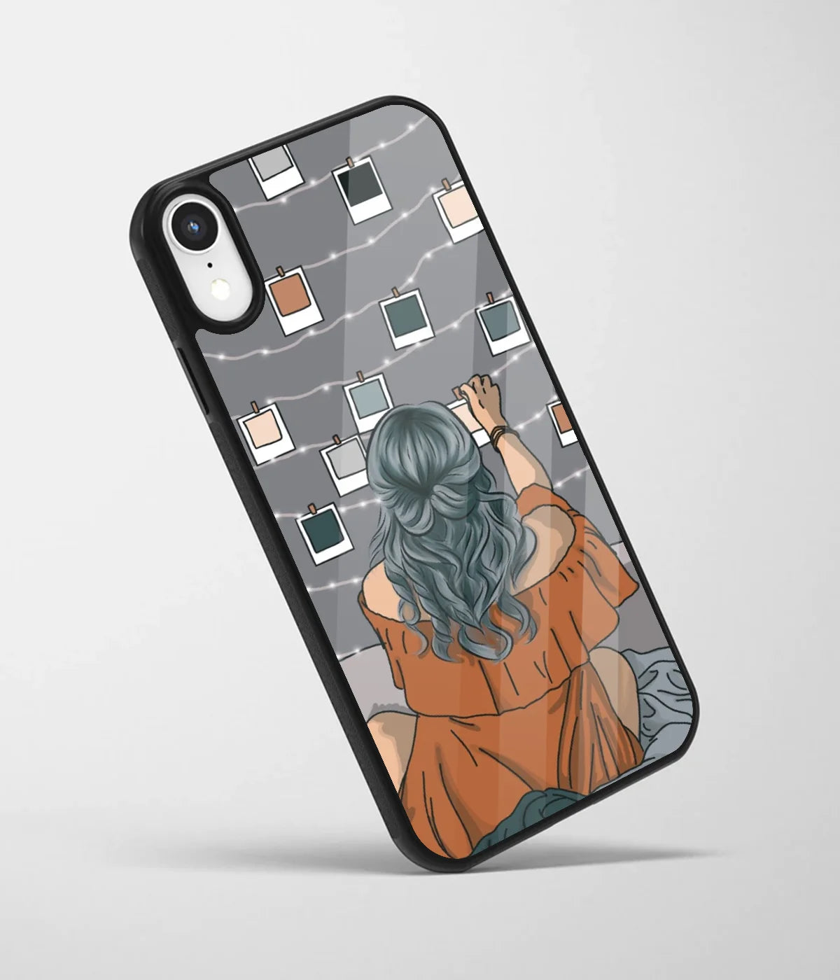 An angled view of a glass phone case featuring a vibrant design.