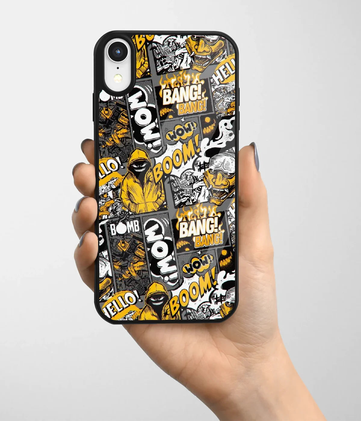 A hand holding a glass phone case with a colorful design.