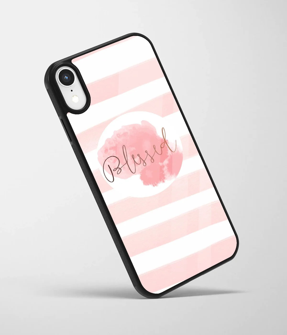 An angled view of a glass phone case featuring a vibrant design.