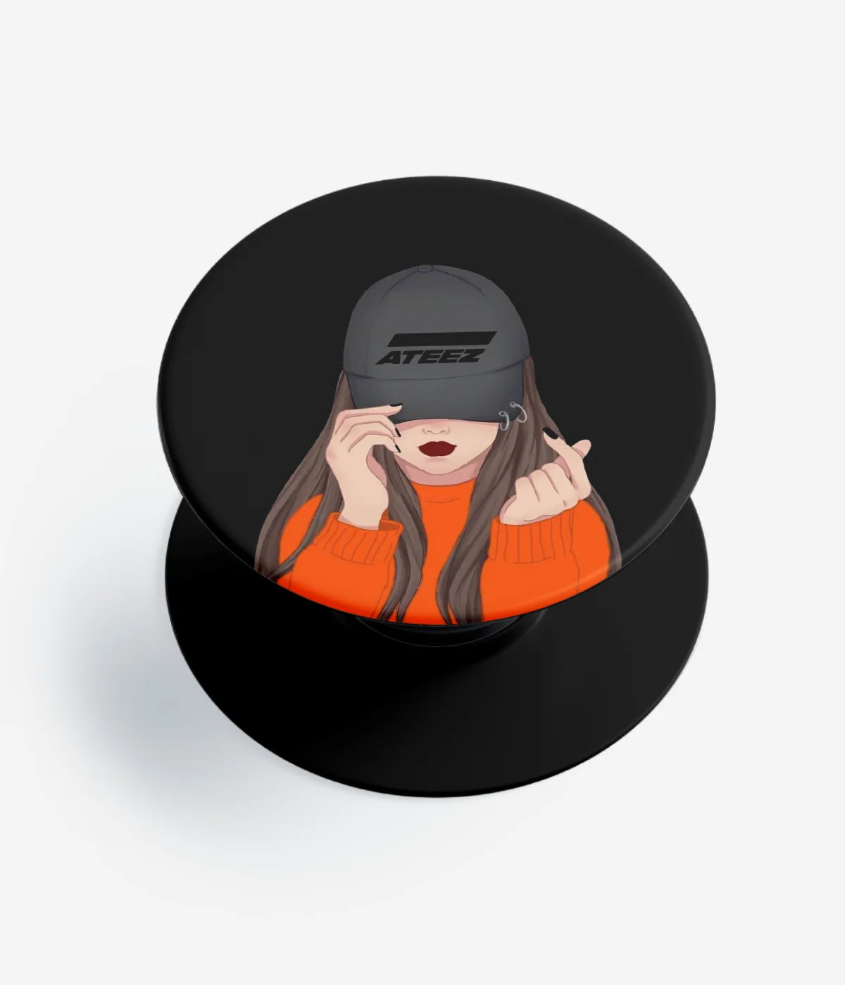 A top-down view of a phone grip holder on a clean white background