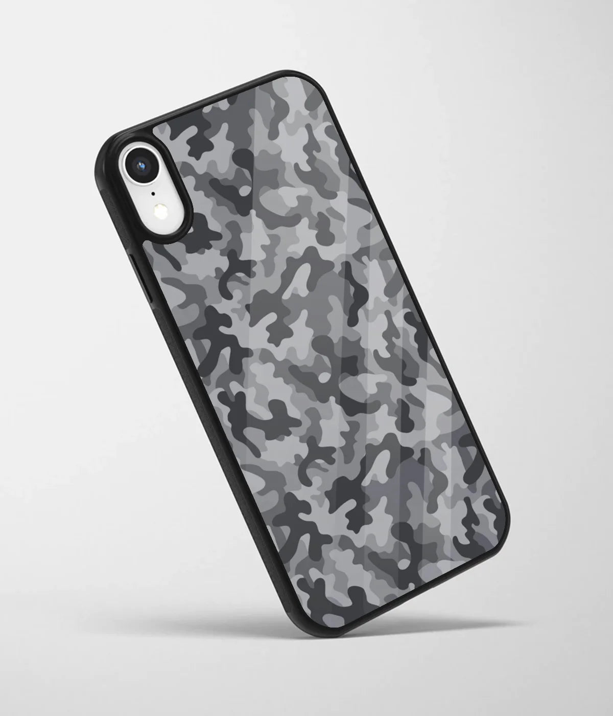 An angled view of a glass phone case featuring a vibrant design.