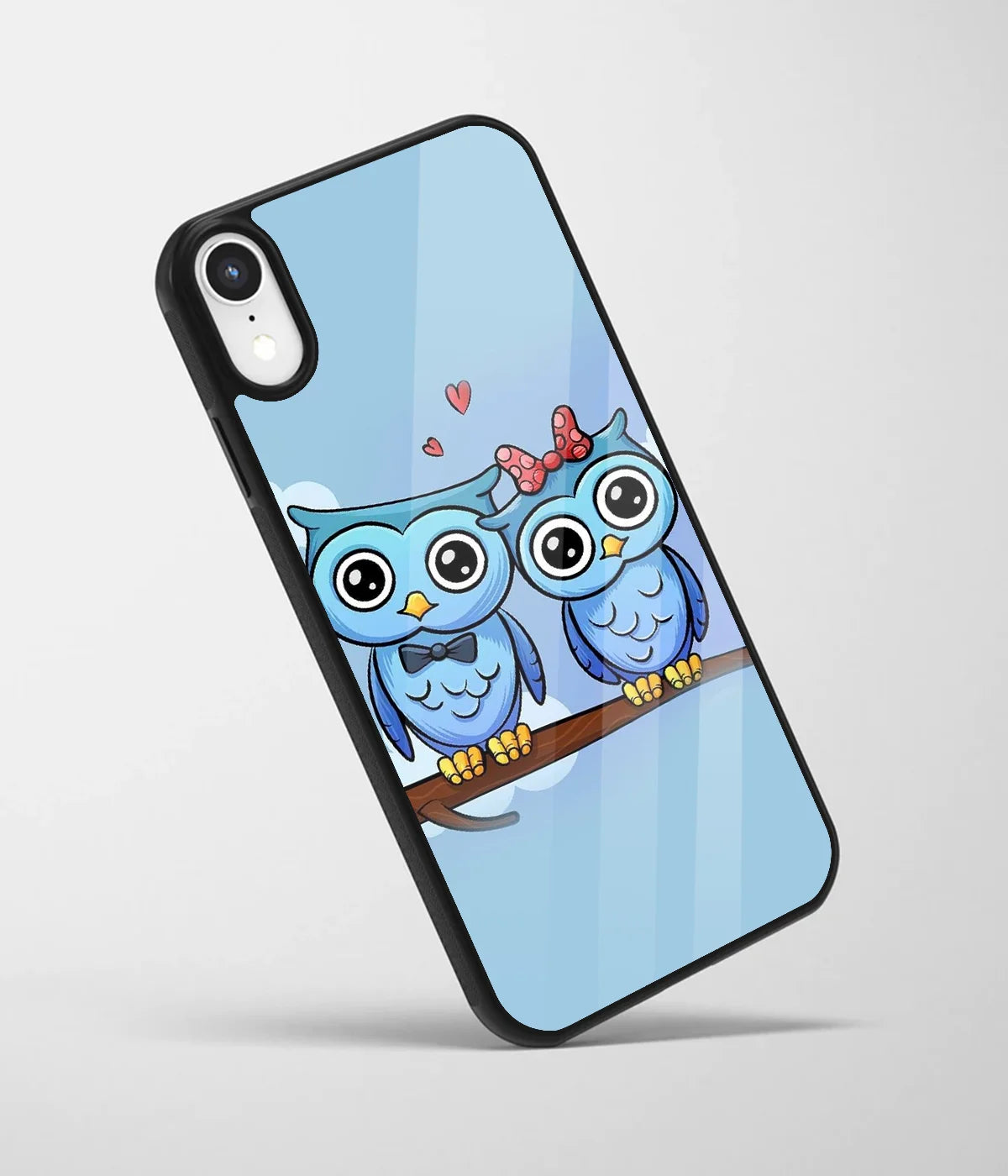 An angled view of a glass phone case featuring a vibrant design.