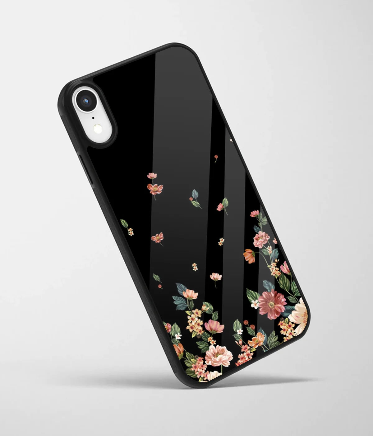 An angled view of a glass phone case featuring a vibrant design.