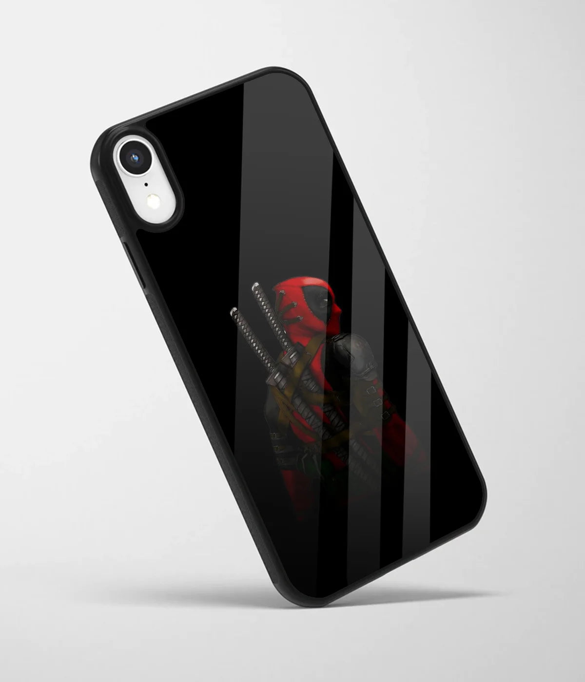 An angled view of a glass phone case featuring a vibrant design.