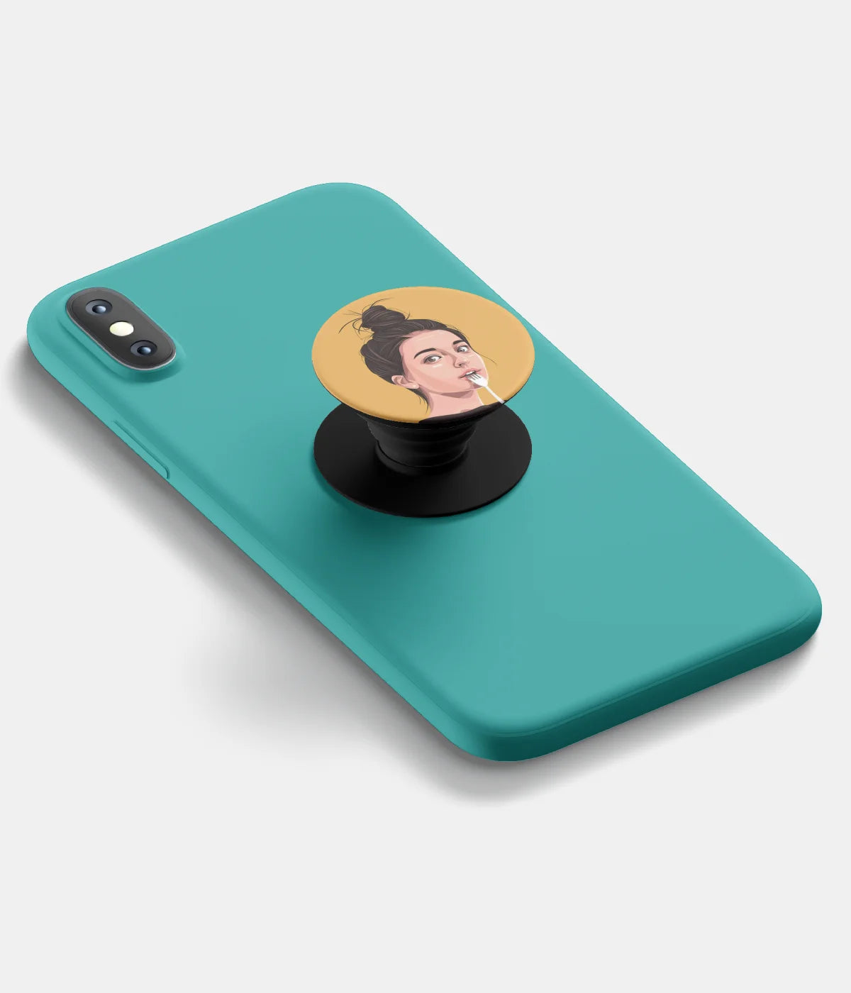 A top-down view of a phone grip holder attached to a mobile phone case on a white background