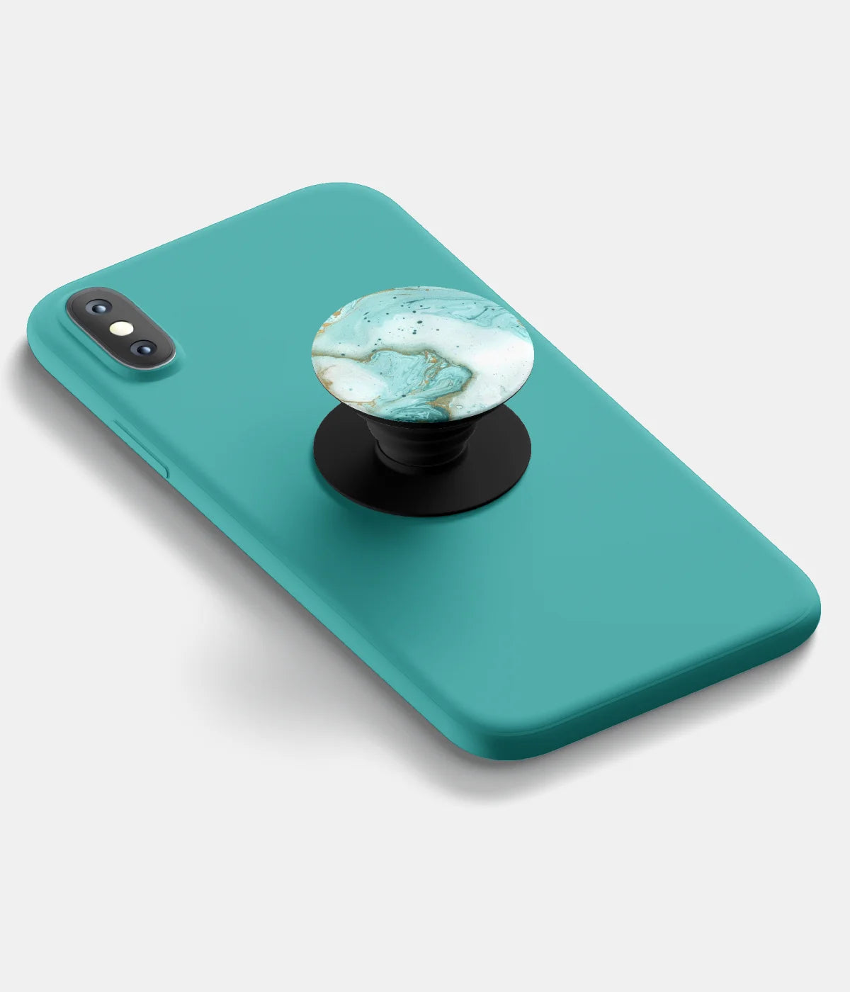 A top-down view of a phone grip holder attached to a mobile phone case on a white background