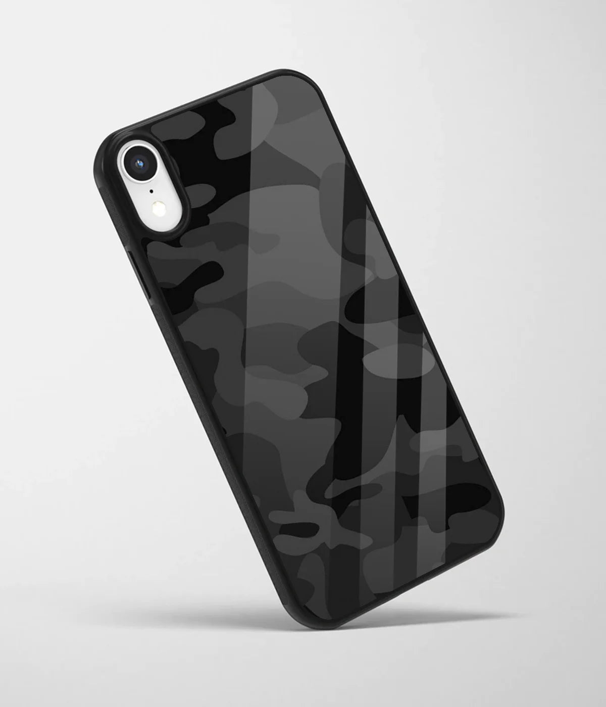 An angled view of a glass phone case featuring a vibrant design.