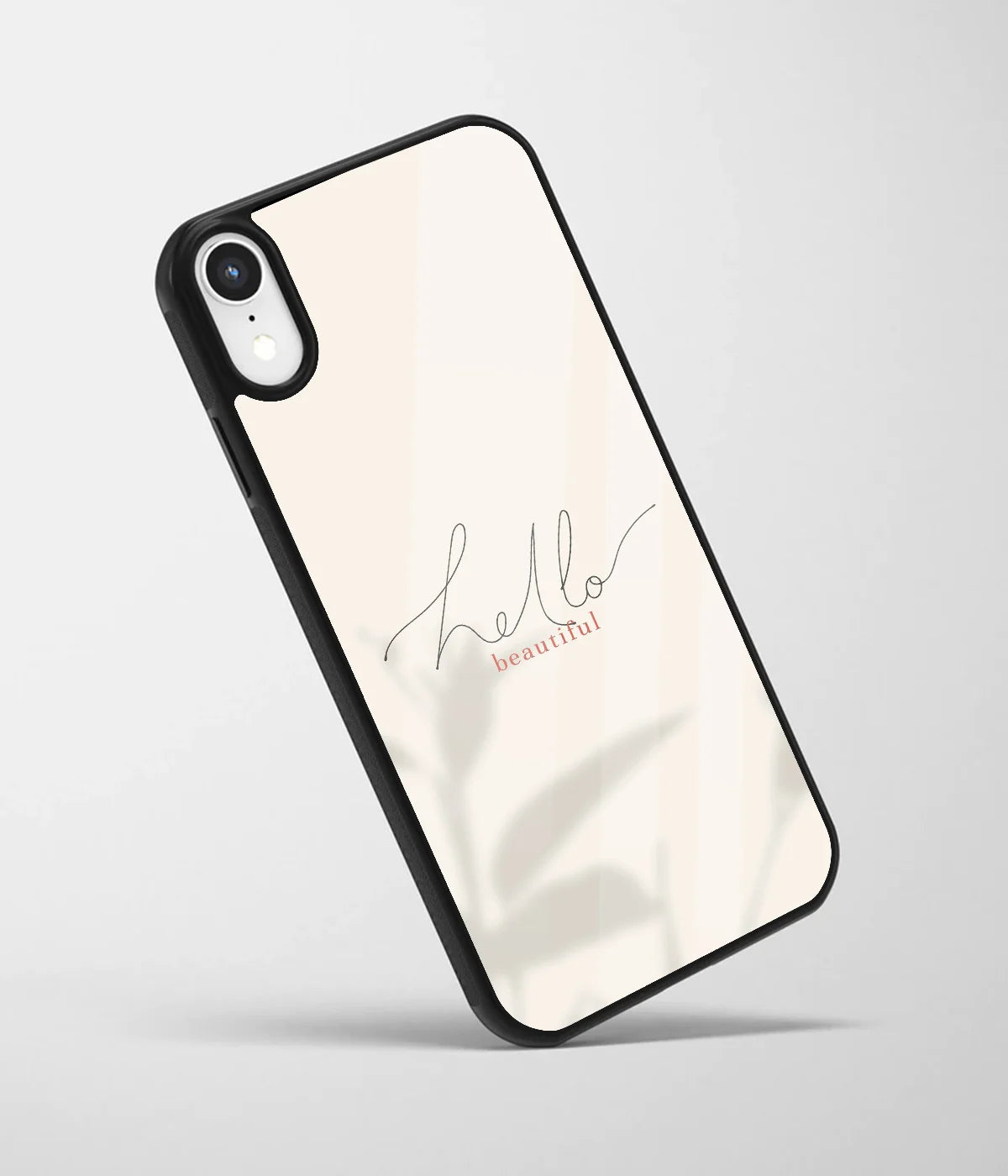 An angled view of a glass phone case featuring a vibrant design.