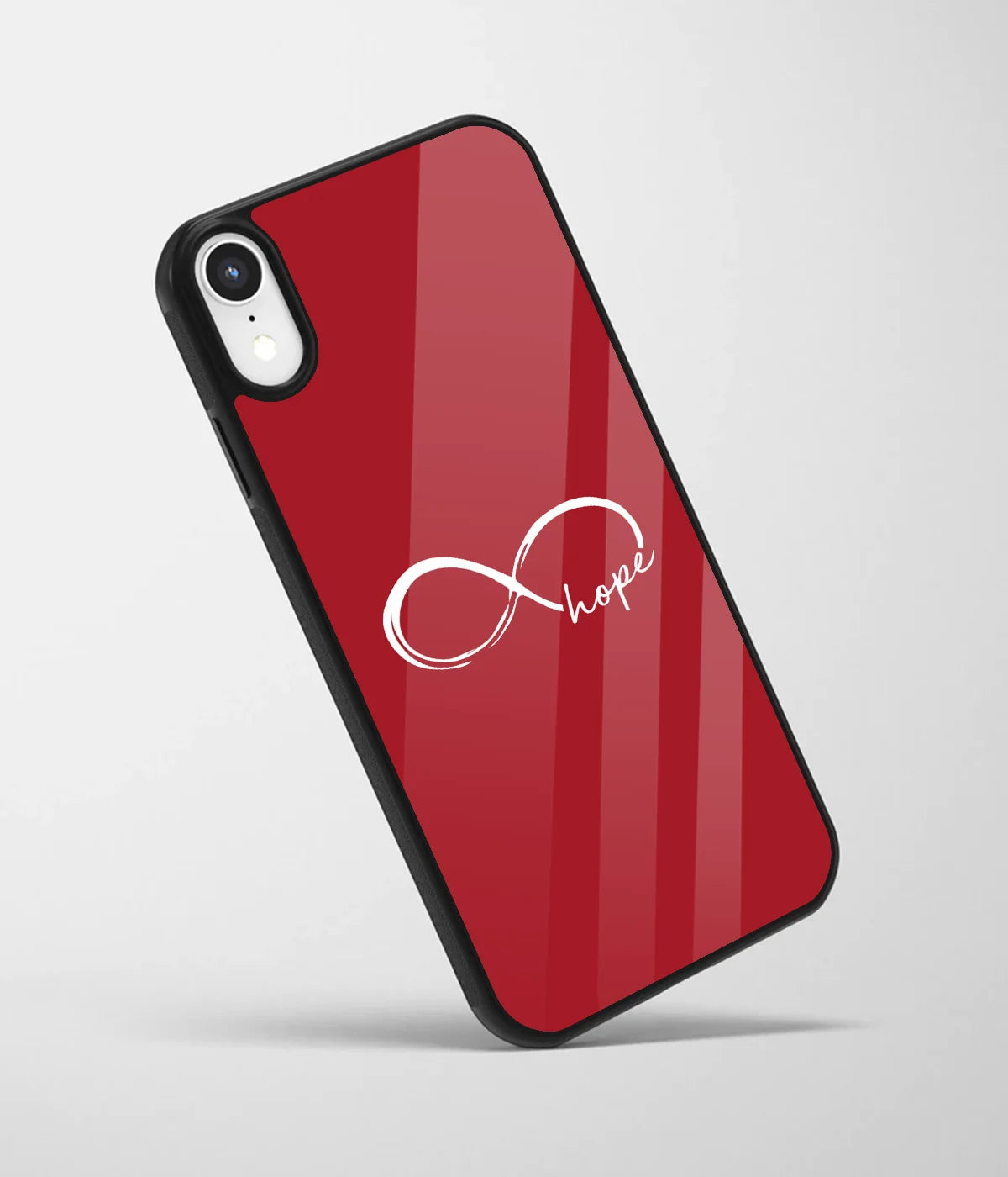 An angled view of a glass phone case featuring a vibrant design.