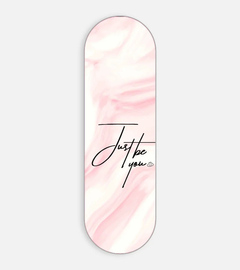 Mobile phone grip slider with a colorful design on a white background