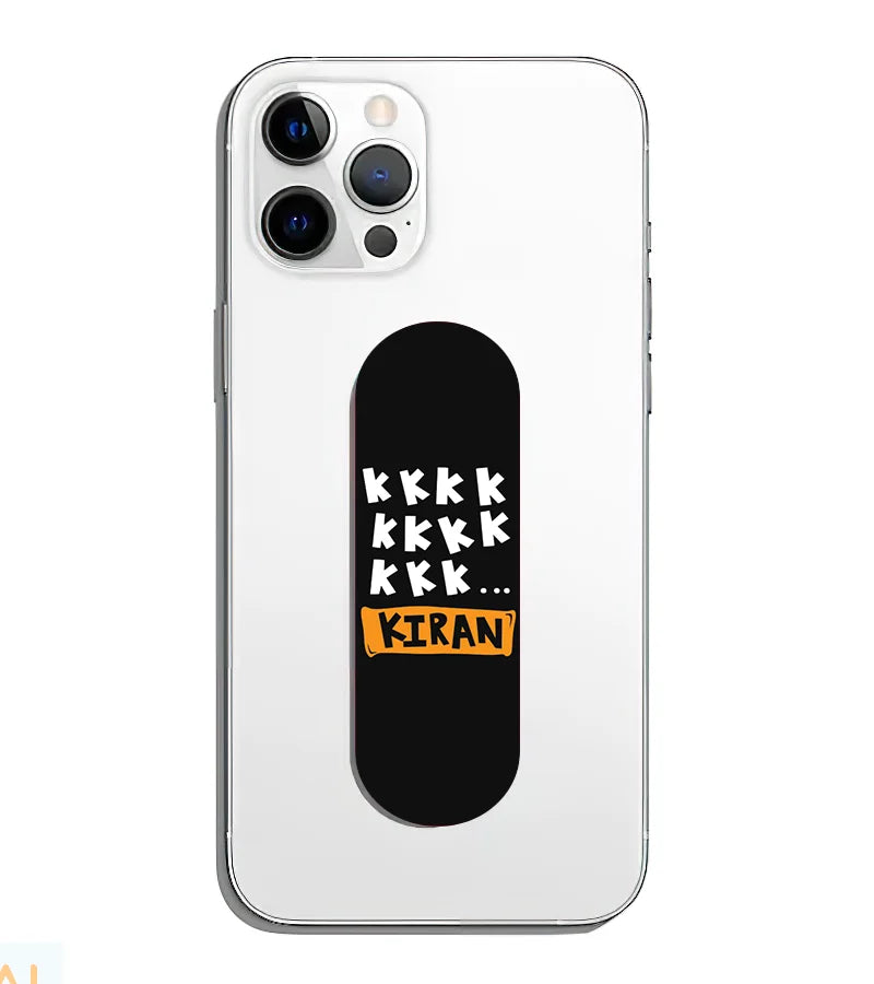 A phone grip slider applied to the back of a smartphone.