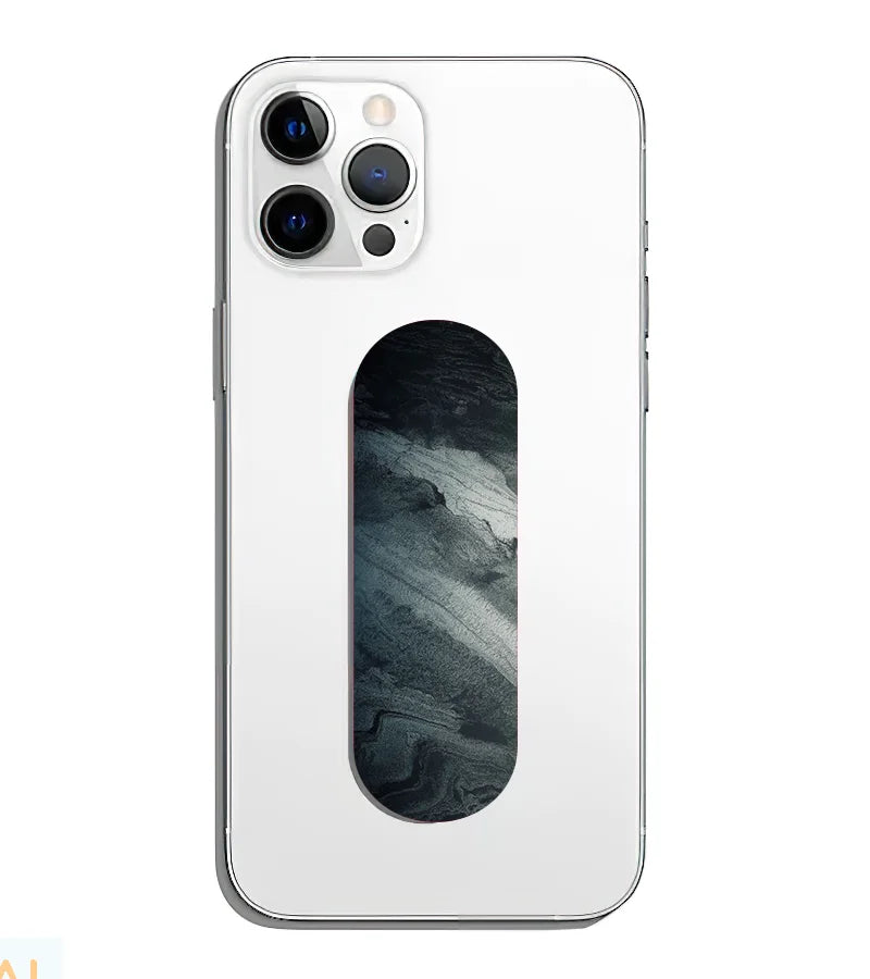 A phone grip slider applied to the back of a smartphone.