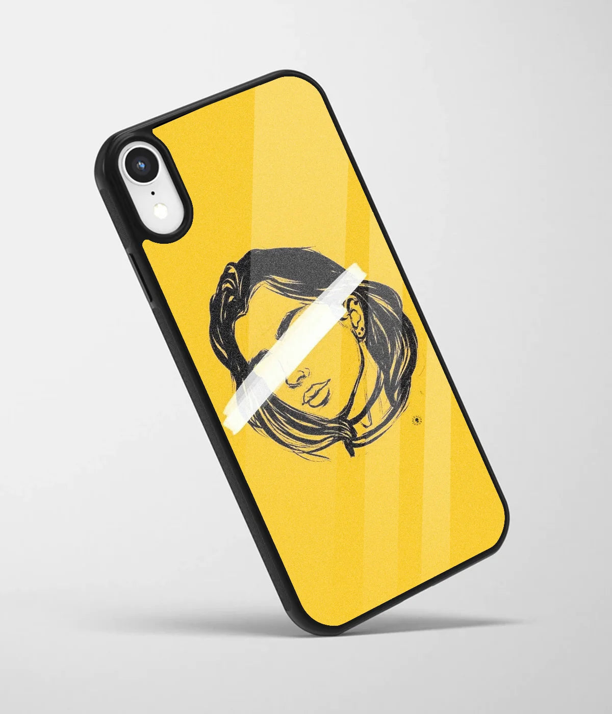 An angled view of a glass phone case featuring a vibrant design.