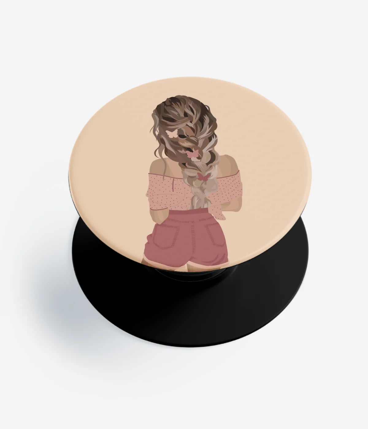 A top-down view of a phone grip holder on a clean white background