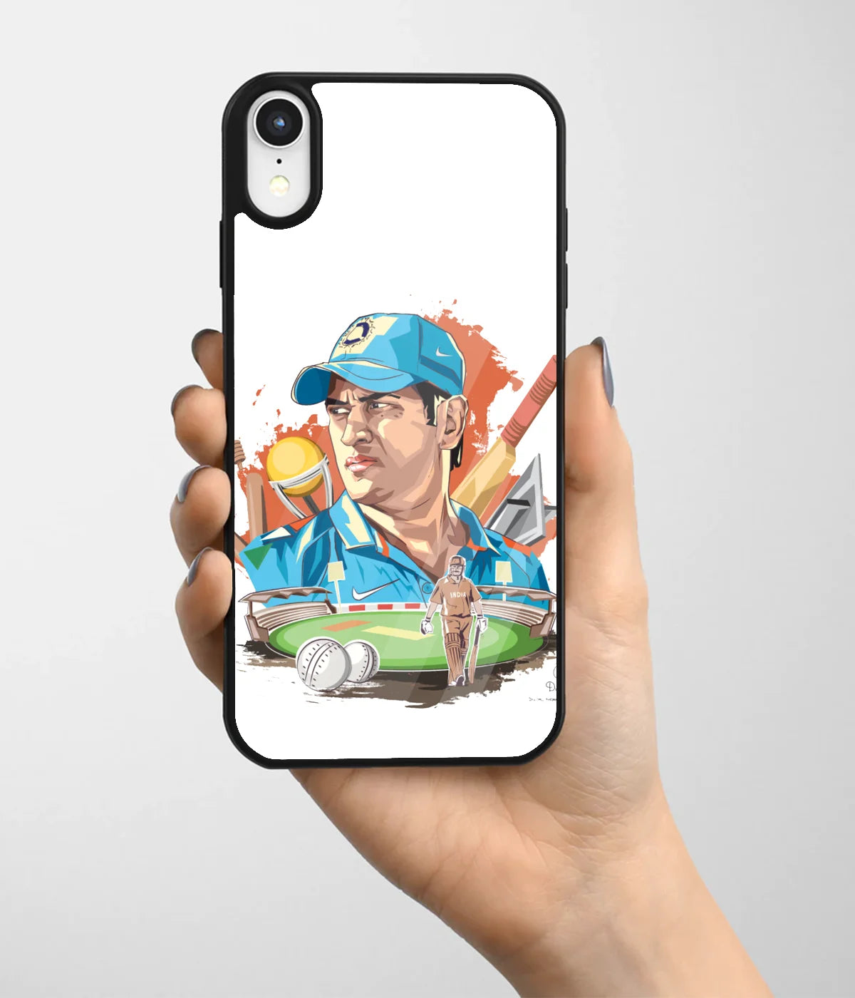 A hand holding a glass phone case with a colorful design.
