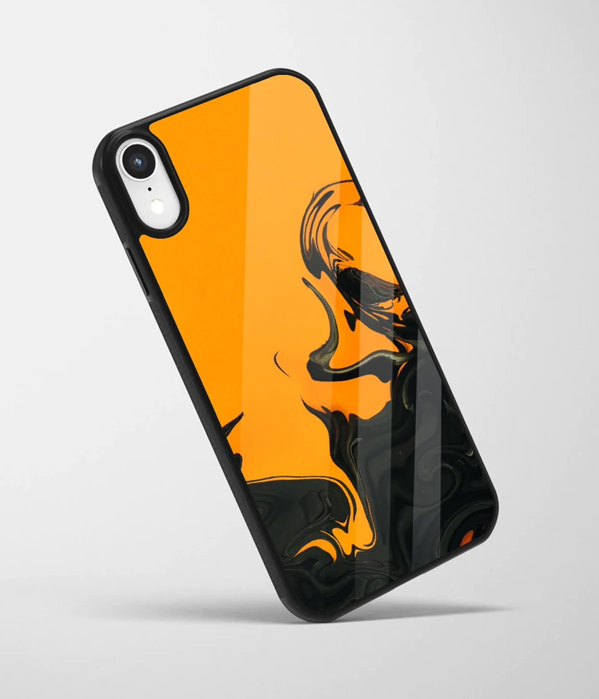 An angled view of a glass phone case featuring a vibrant design.