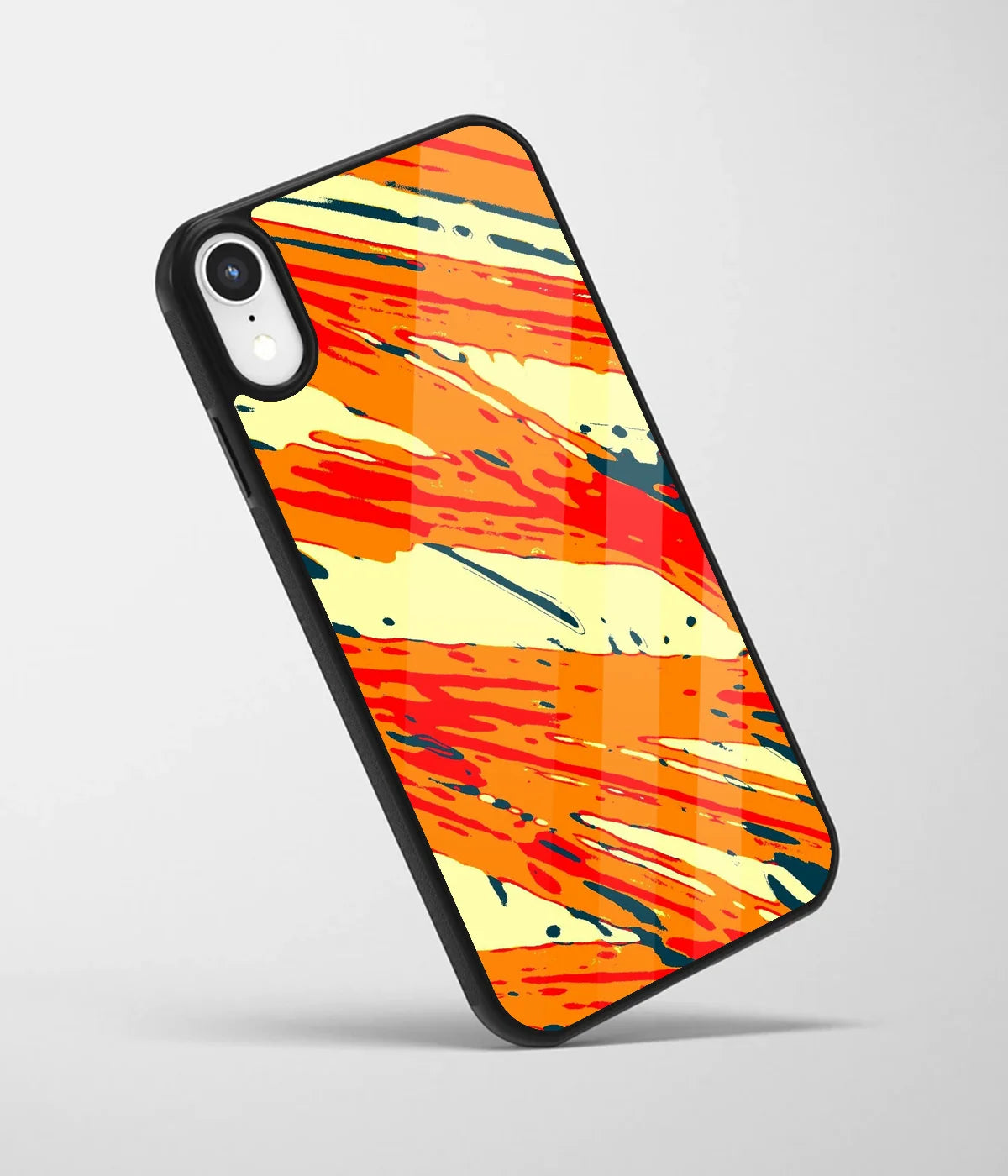 An angled view of a glass phone case featuring a vibrant design.
