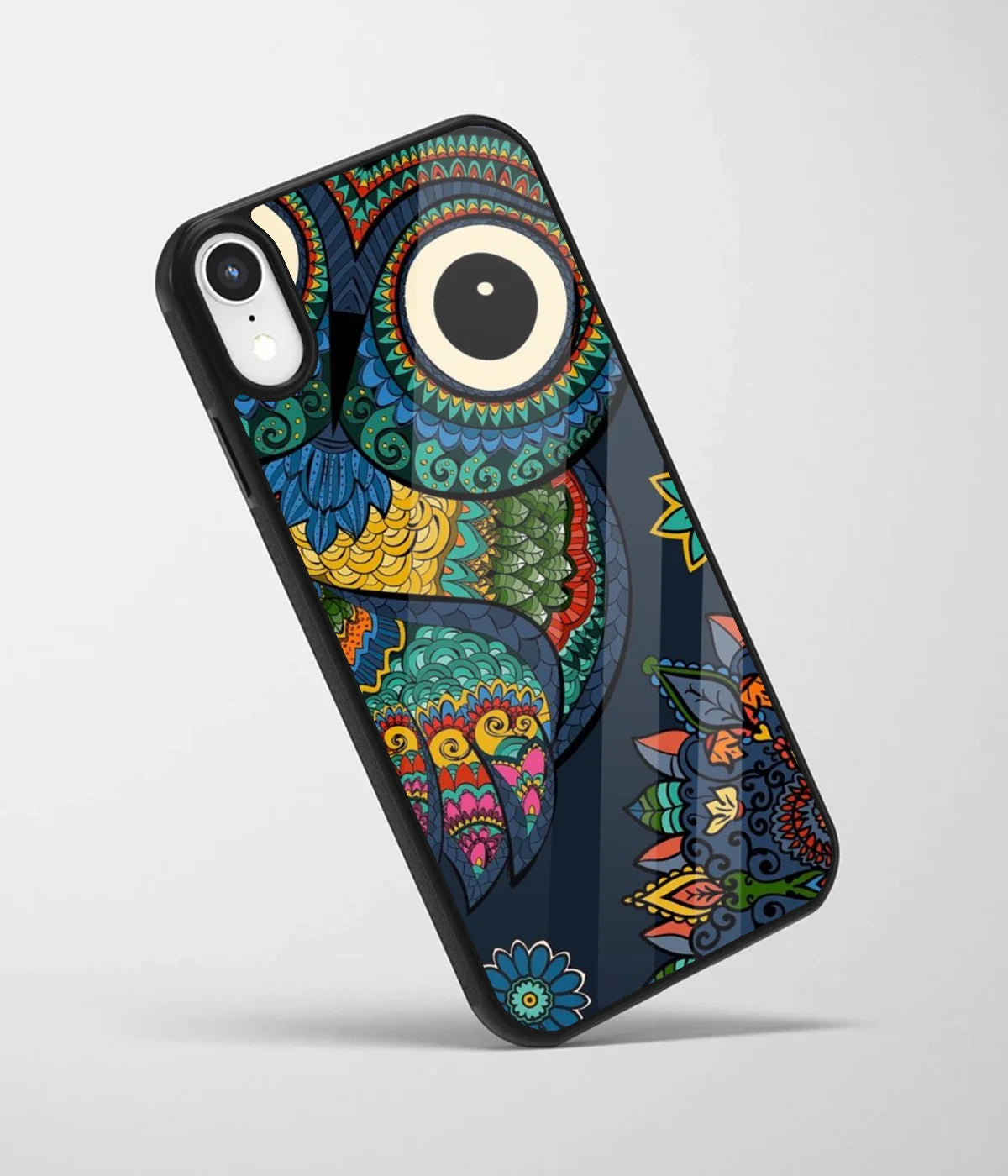 An angled view of a glass phone case featuring a vibrant design.