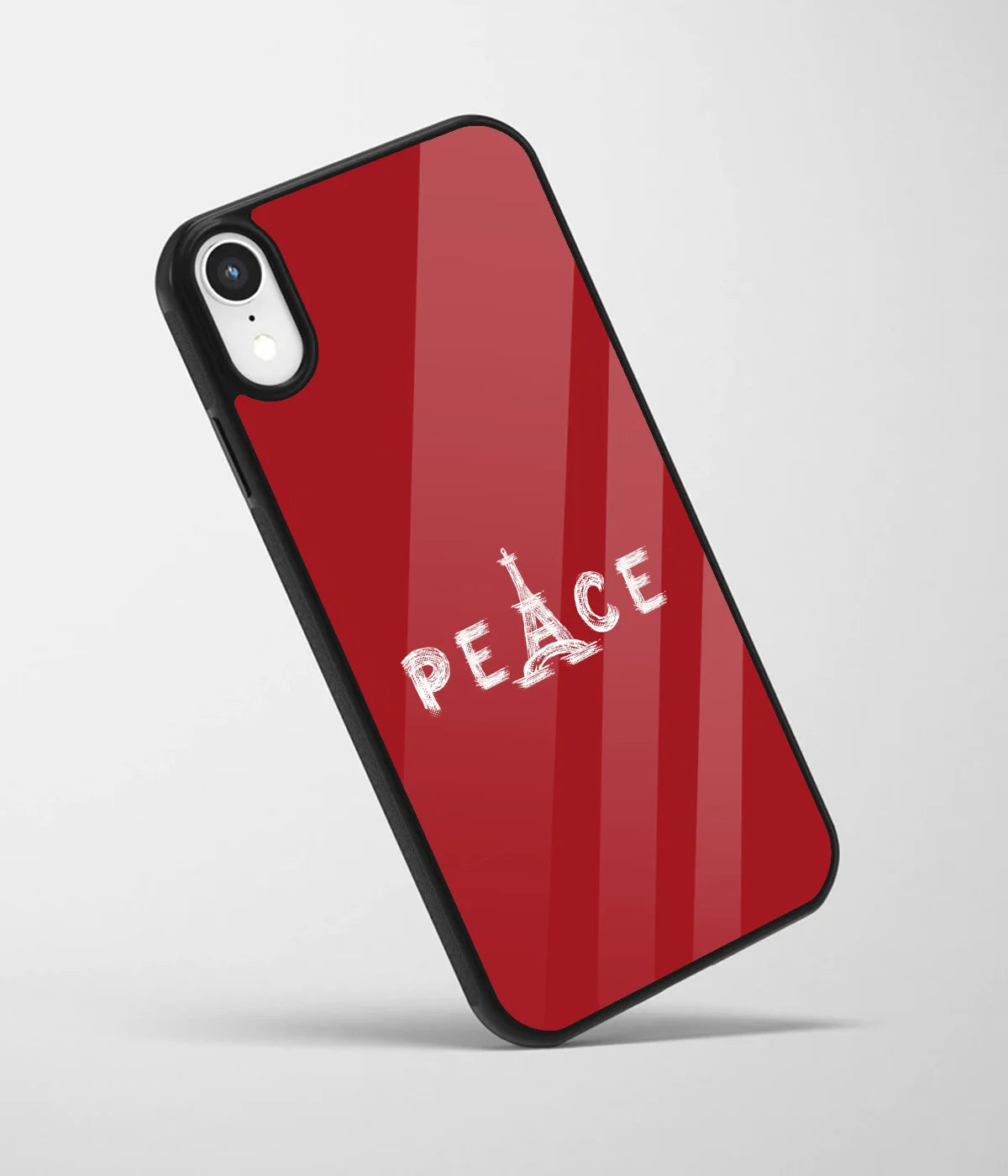 An angled view of a glass phone case featuring a vibrant design.