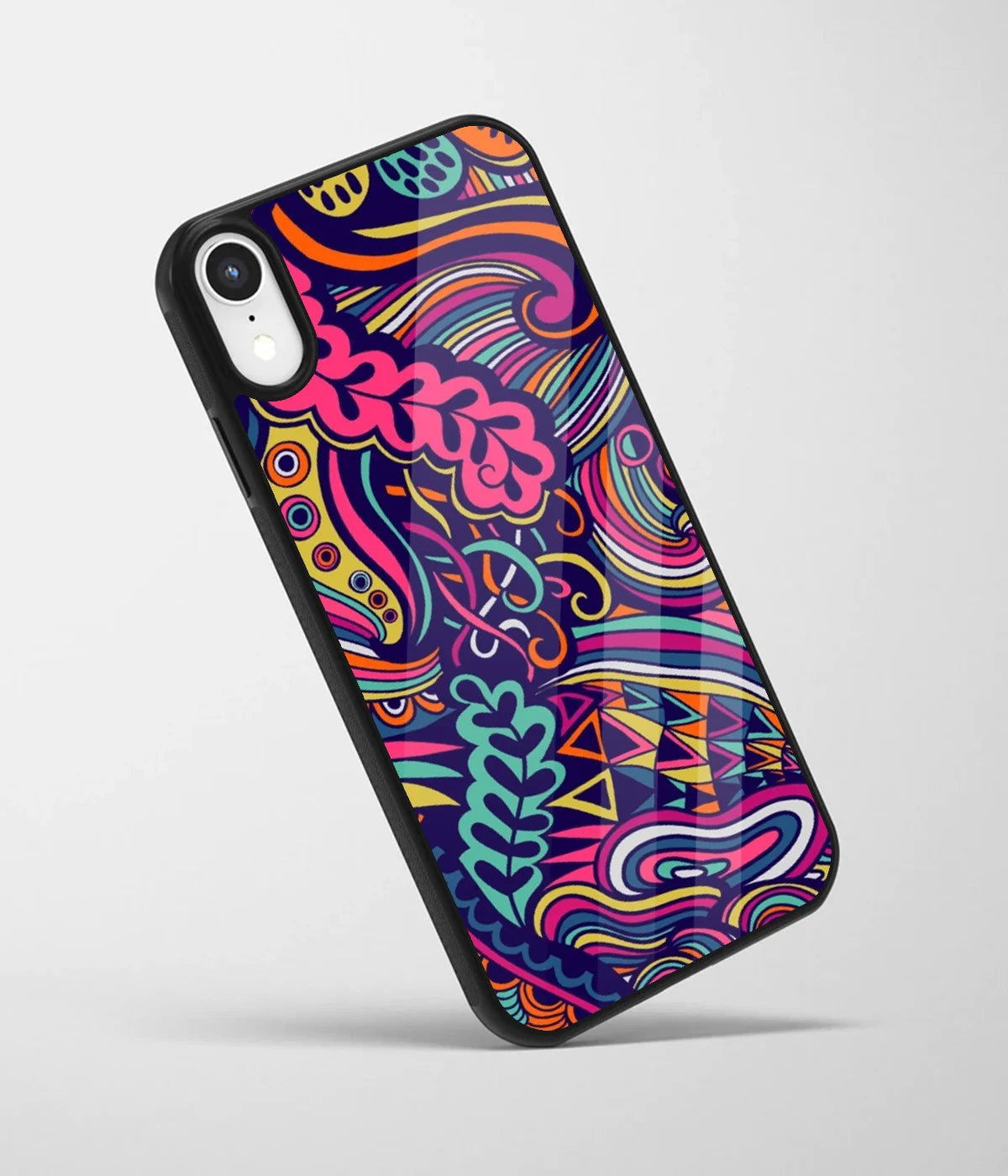 An angled view of a glass phone case featuring a vibrant design.