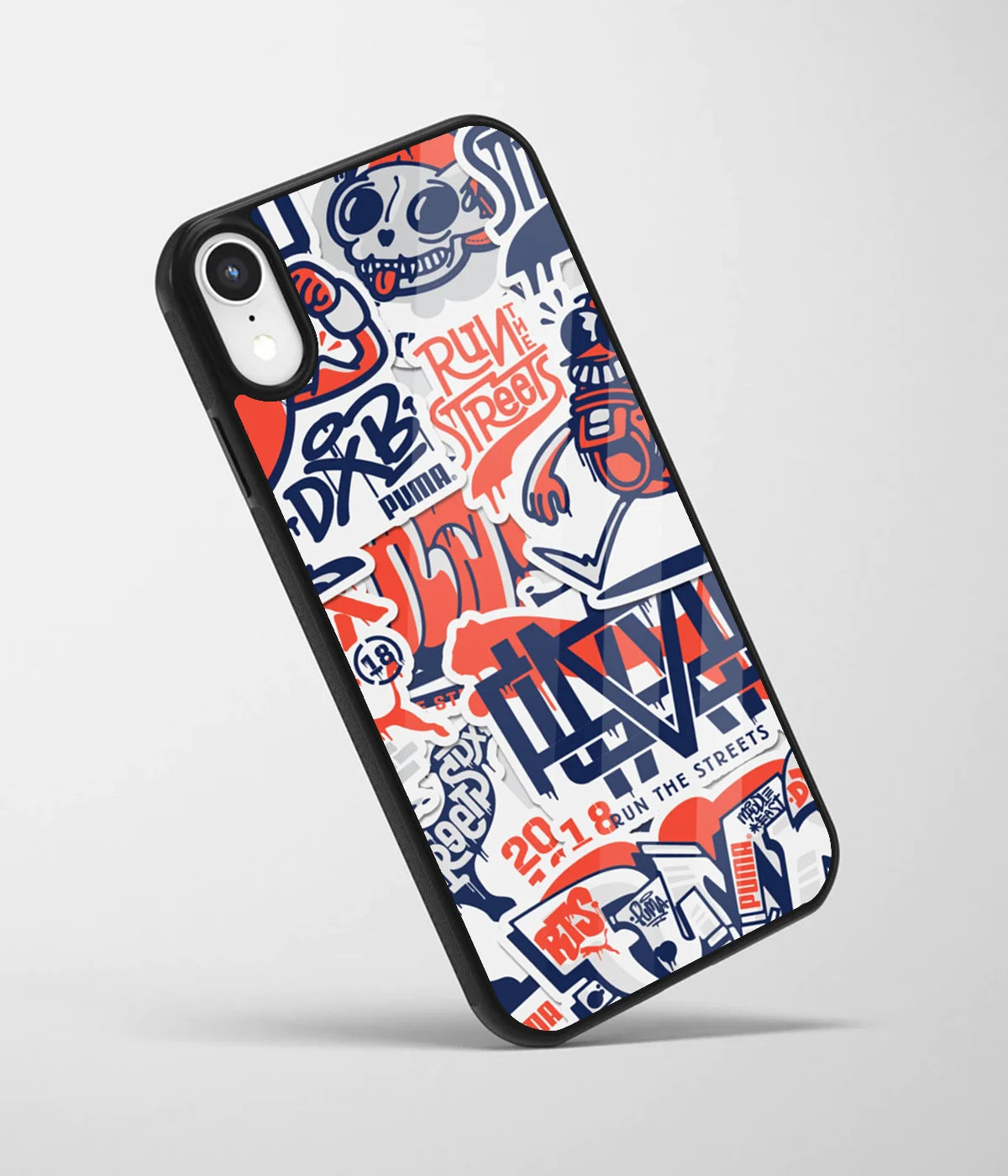 An angled view of a glass phone case featuring a vibrant design.