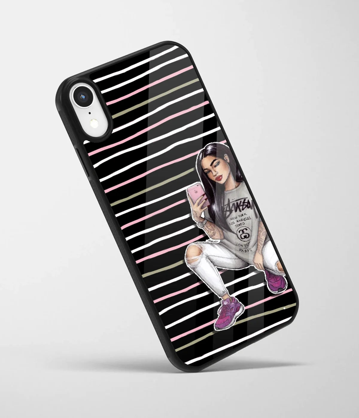 An angled view of a glass phone case featuring a vibrant design.