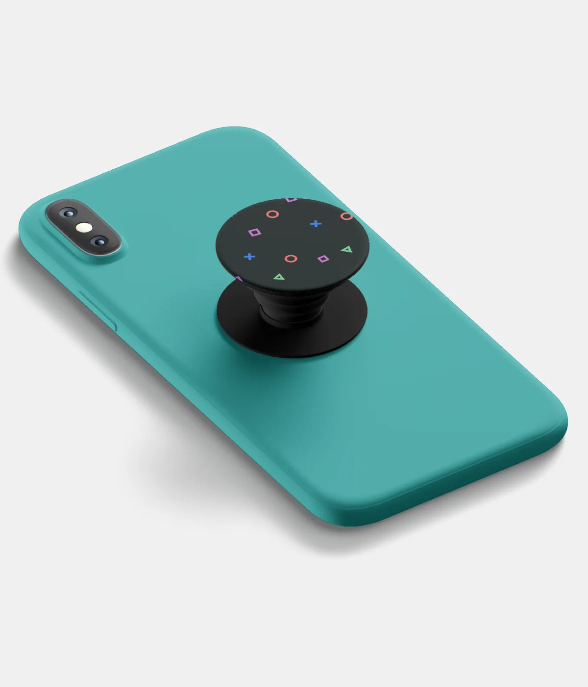 A top-down view of a phone grip holder attached to a mobile phone case on a white background
