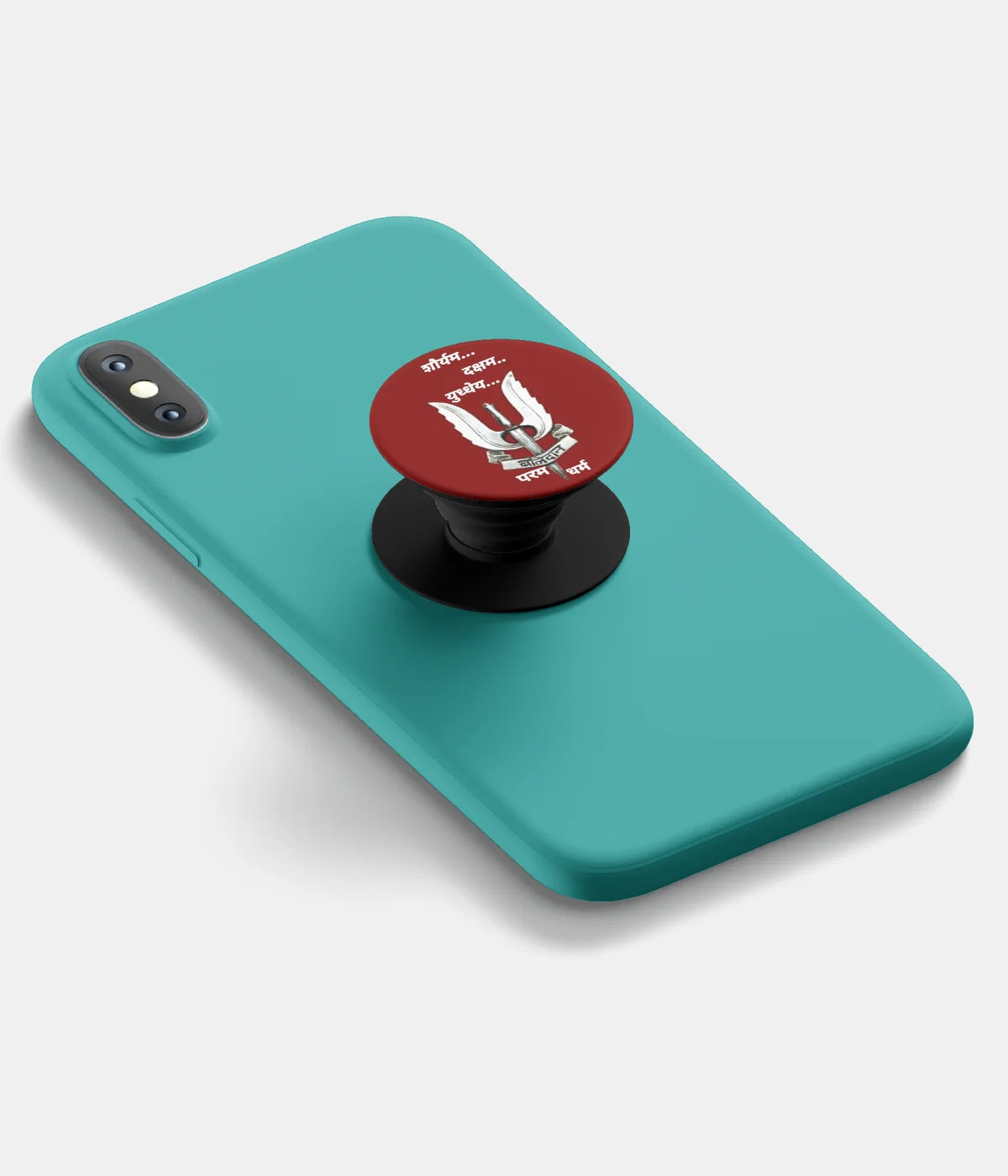 A top-down view of a phone grip holder attached to a mobile phone case on a white background