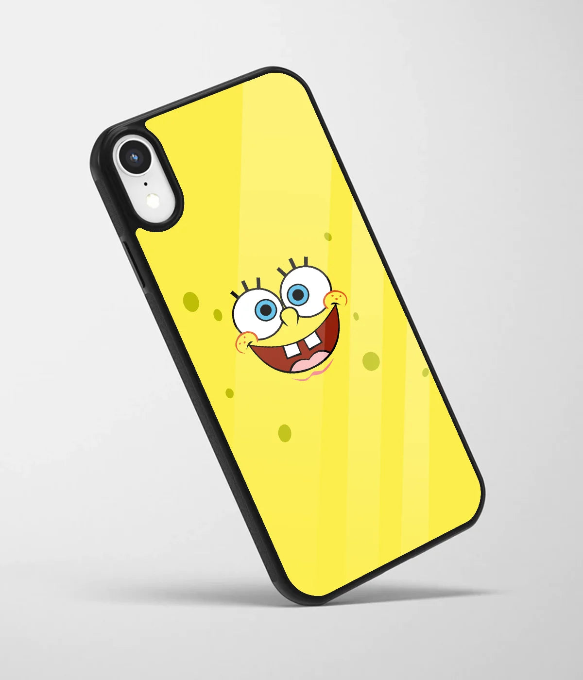 An angled view of a glass phone case featuring a vibrant design.