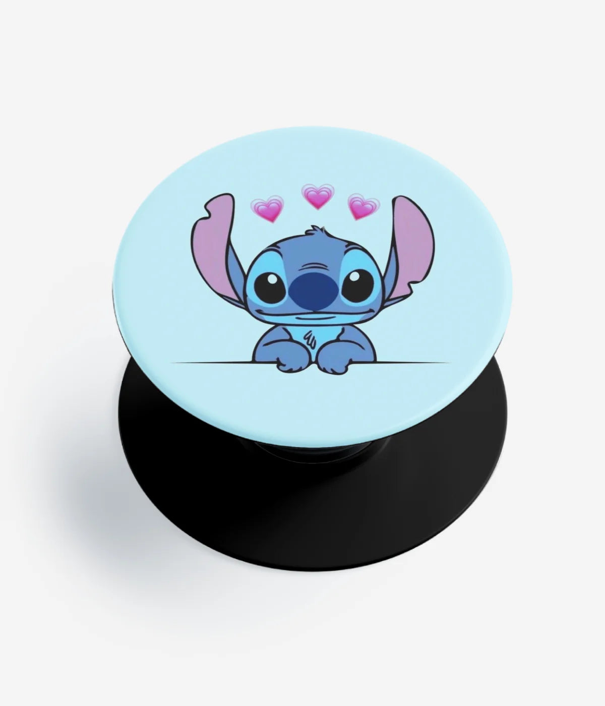 A top-down view of a phone grip holder on a clean white background