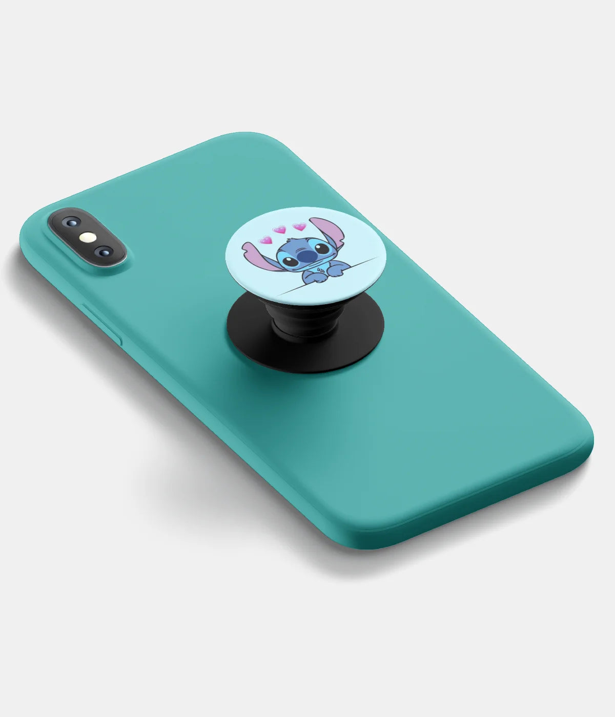 A top-down view of a phone grip holder attached to a mobile phone case on a white background