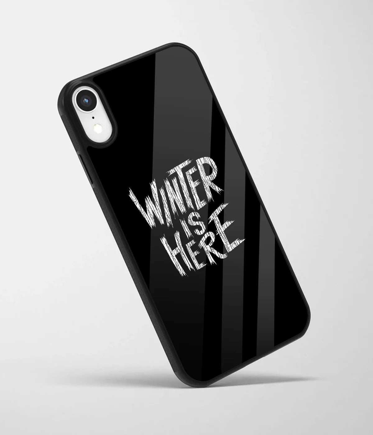 An angled view of a glass phone case featuring a vibrant design.