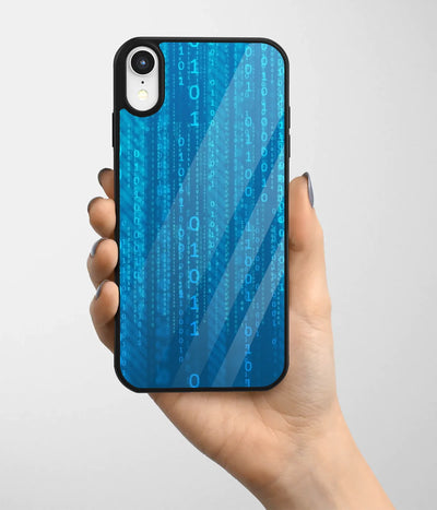 A hand holding a glass phone case with a colorful design.