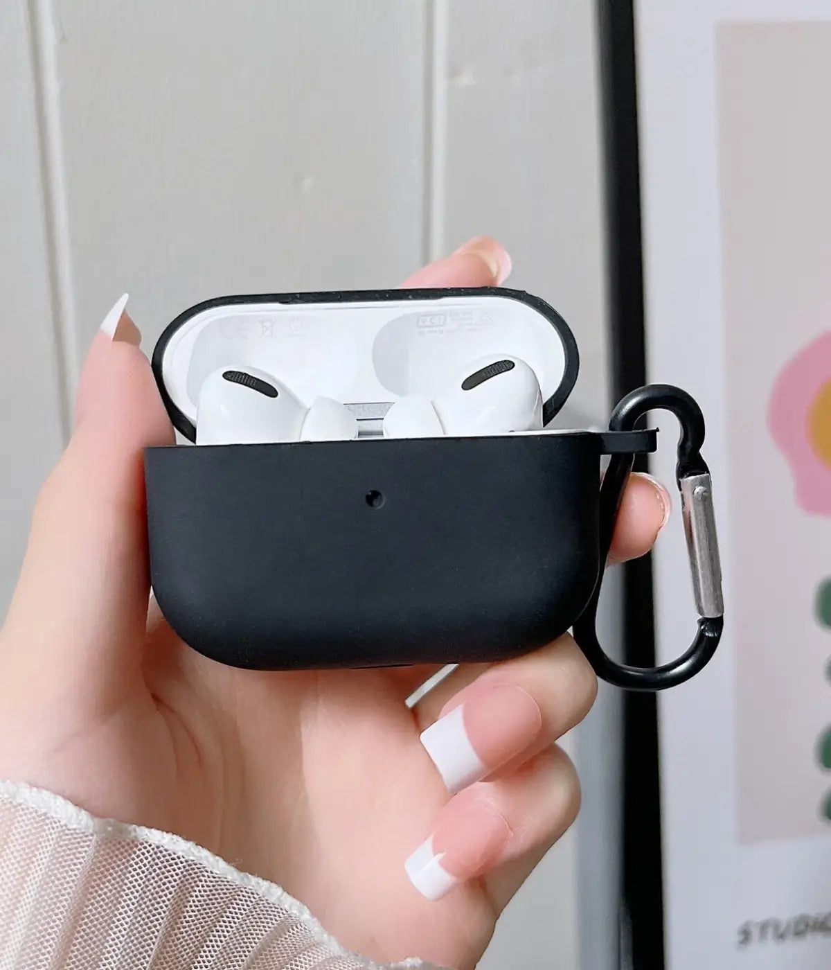 A Black liquid silicone case for the Airpods.