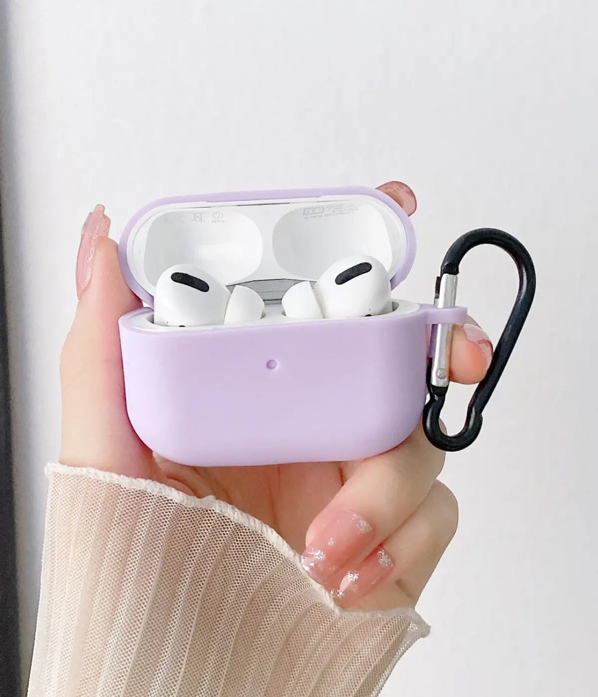 A Lilac liquid silicone case for the Airpods.