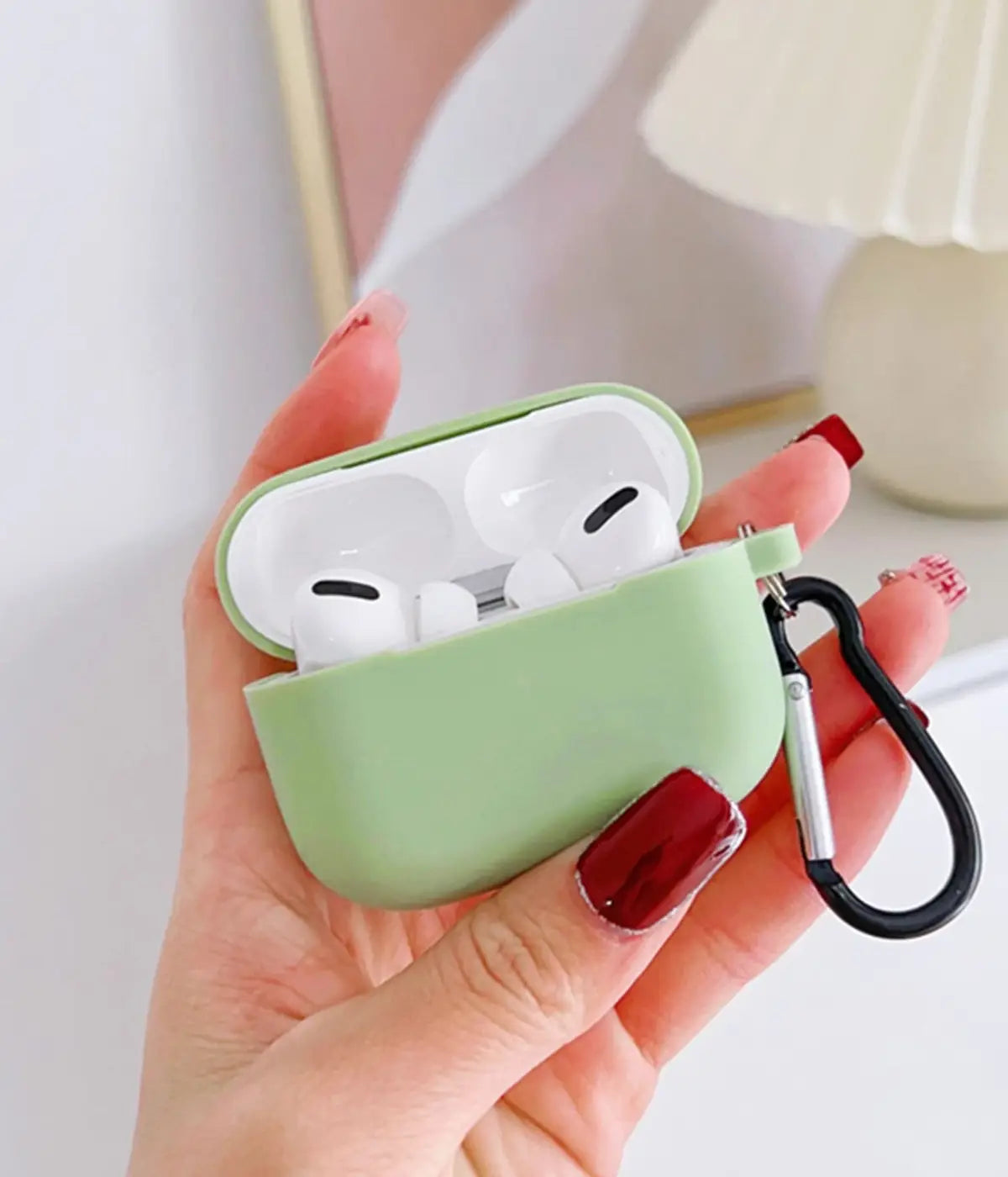 A Pistachio Green liquid silicone case for the Airpods.