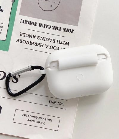 Close-up of a White liquid silicone protective case for Apple AirPods held in a hand
