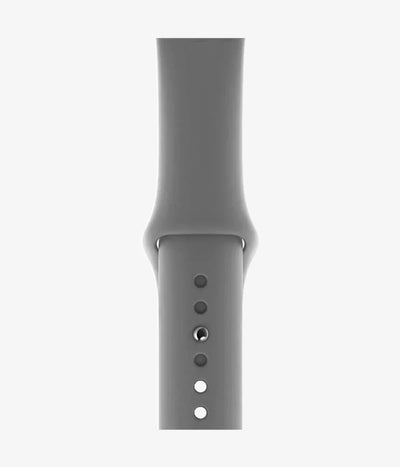 Close-up of the silicone Apple Watch band, showcasing its smooth finish and secure pin-and-tuck closure mechanism.