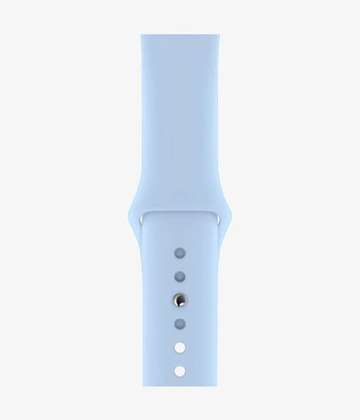 Close-up of the silicone Apple Watch band, showcasing its smooth finish and secure pin-and-tuck closure mechanism.