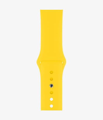 Close-up of the silicone Apple Watch band, showcasing its smooth finish and secure pin-and-tuck closure mechanism.