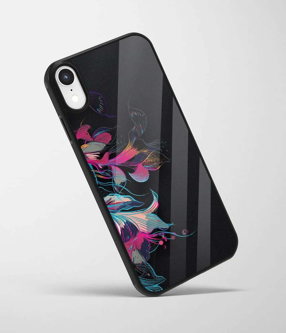 An angled view of a glass phone case featuring a vibrant design.