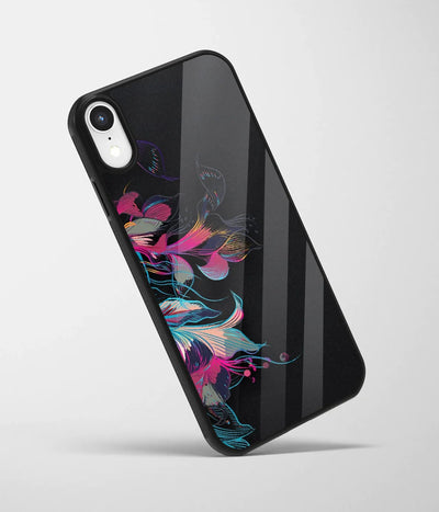 An angled view of a glass phone case featuring a vibrant design.