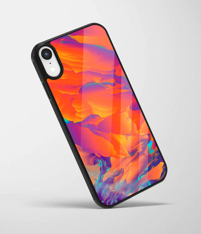 An angled view of a glass phone case featuring a vibrant design.