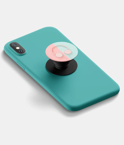 A top-down view of a phone grip holder attached to a mobile phone case on a white background