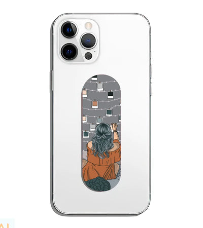 A phone grip slider applied to the back of a smartphone.