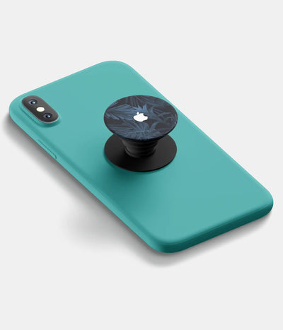 A top-down view of a phone grip holder attached to a mobile phone case on a white background