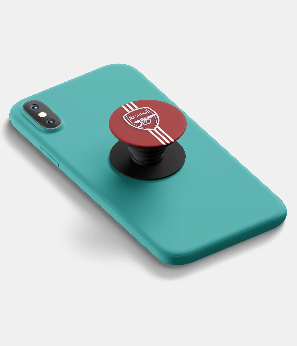 A top-down view of a phone grip holder attached to a mobile phone case on a white background