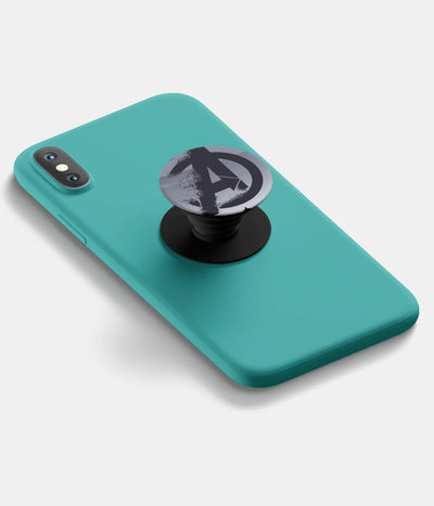 A top-down view of a phone grip holder attached to a mobile phone case on a white background