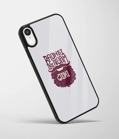 An angled view of a glass phone case featuring a vibrant design.