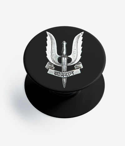 A top-down view of a phone grip holder on a clean white background